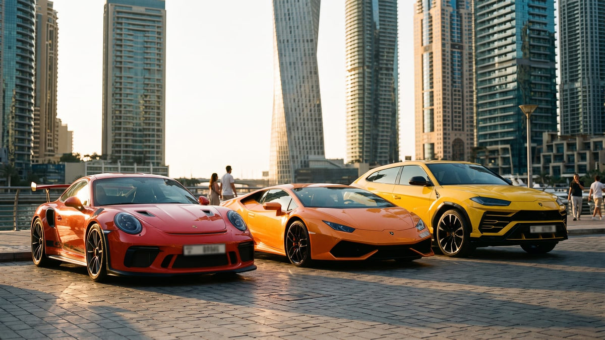 Supercars lined up for rental on Dubai Marina promenade at sunset